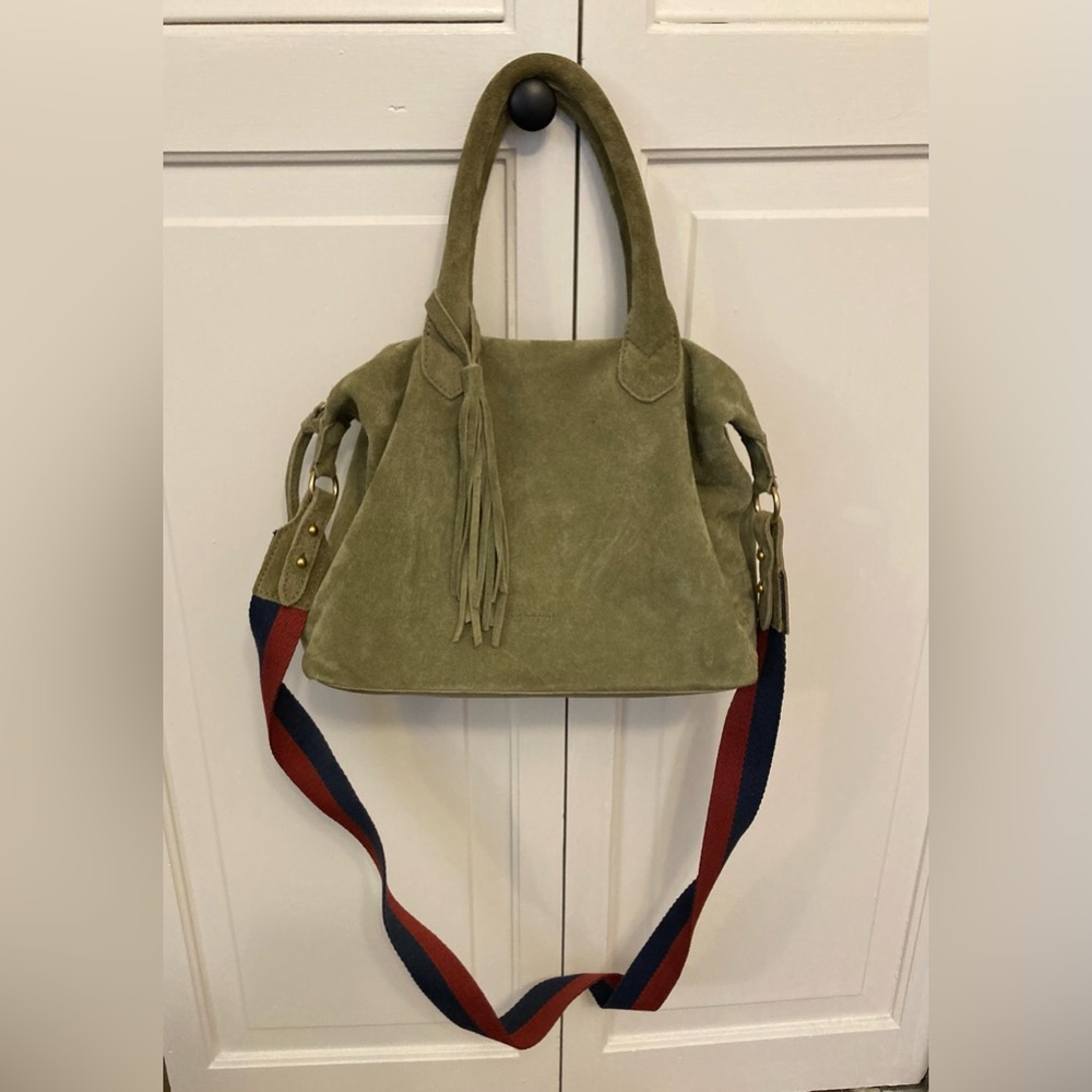 Green suede Margo shoulder bag with blue and red guitar strap